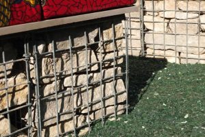 Low garden wall made from 500mm gabions with seating on top